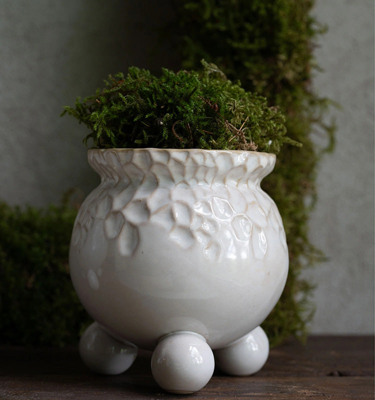 Anya kruka Offwhitemelerad M med kulfötter