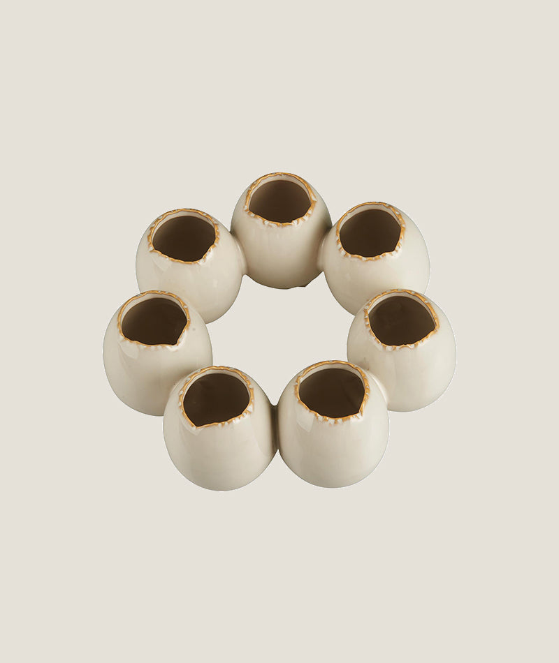 VAS / Äggformade Vaser i cirkel för 7 blommor