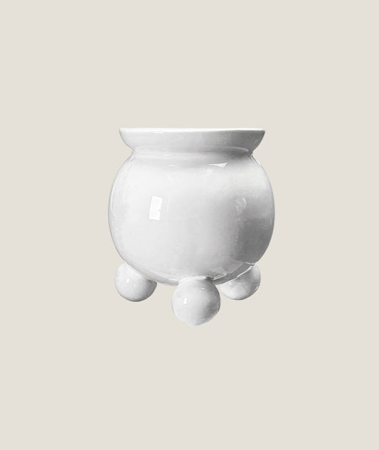 Anya kruka vit L med kulfötter