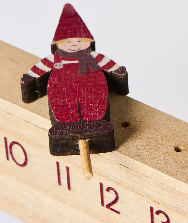 Julkalender 1-24 m.vandrande jultomtens hjälpreda