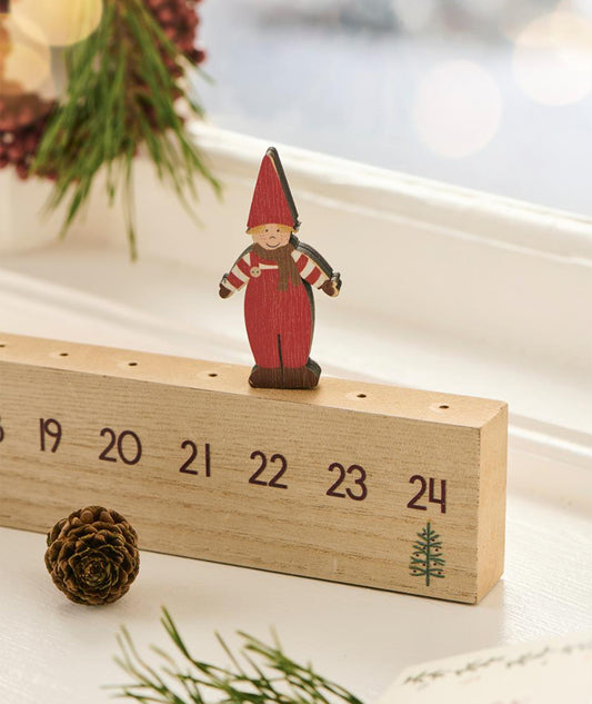 Julkalender 1-24 m.vandrande jultomtens hjälpreda