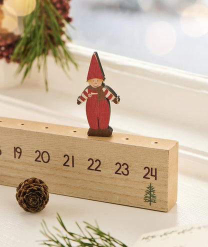 Julkalender 1-24 m.vandrande jultomtens hjälpreda